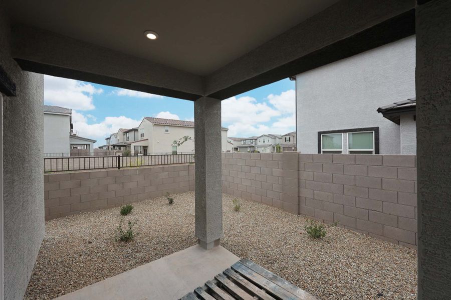 A stone wall with a stone walkway. A stone wall with a stone walkway.