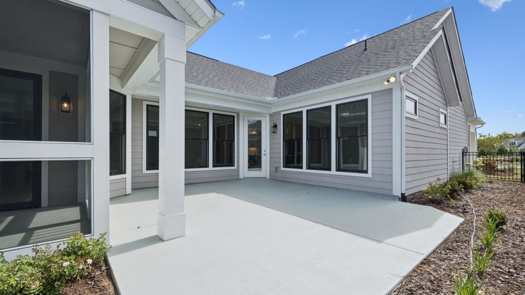 Exterior details and patio area of a home in The Courtyards at Stewarts Creek, Smyrna (Image 20).