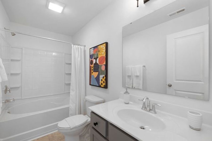 Representative furnished interior of a home built from the Whitney by True Homes in Westbrook Falls, Colfax (Image 29).