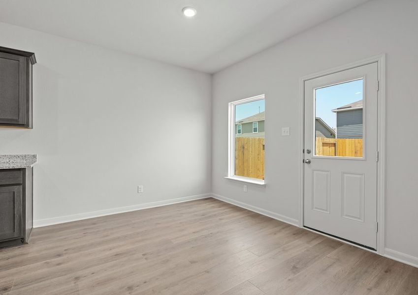 The dining room of the Cypress has a large window. The dining room of the Cypress has a large window.