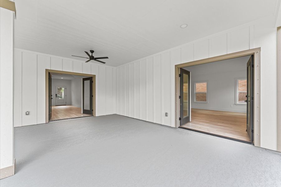 The outdoor living space can be accessed from the kitchen / dining room as well as the primary bedroom.