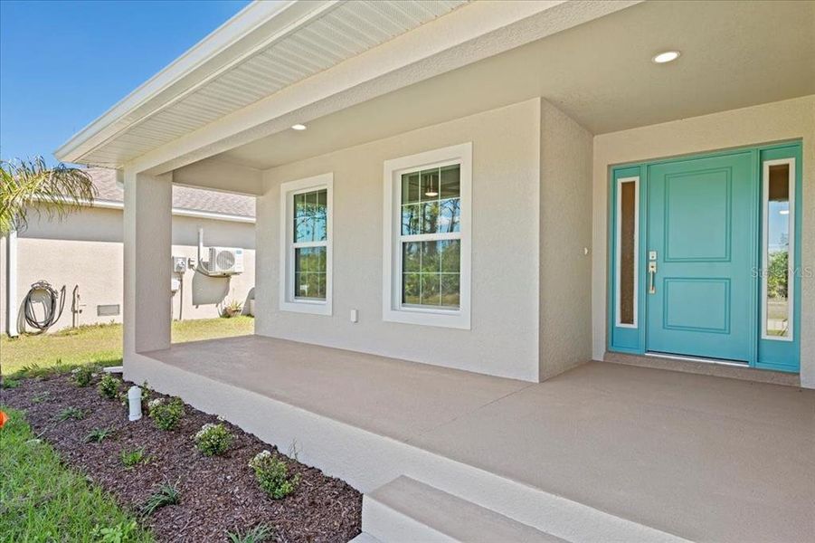 Front exterior of a new home in , Rotonda West, FL, highlighting curb appeal (Image 24). Front exterior of a new home in , Rotonda West, FL, highlighting curb appeal (Image 24).