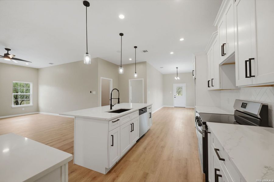 Furnished interior view inside a new home in , Devine (Image 13).