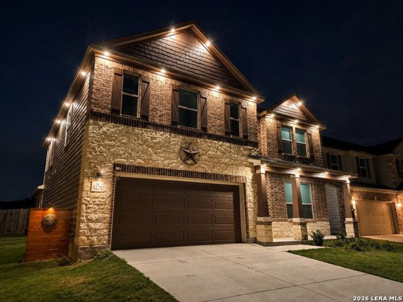 Front exterior of a new home in Canyon Crest, San Antonio, TX, highlighting curb appeal (Image 21). Front exterior of a new home in Canyon Crest, San Antonio, TX, highlighting curb appeal (Image 21).