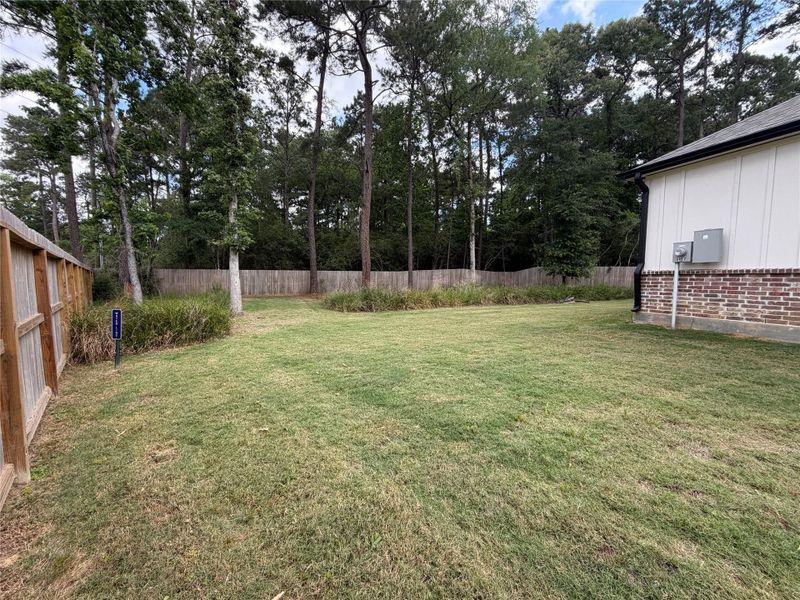 Exterior details and patio area of a home in , Magnolia (Image 4).