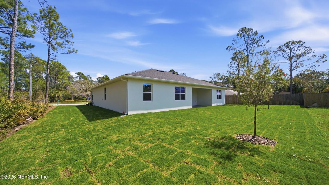 Exterior details and patio area of a home in , Palm Coast (Image 4).