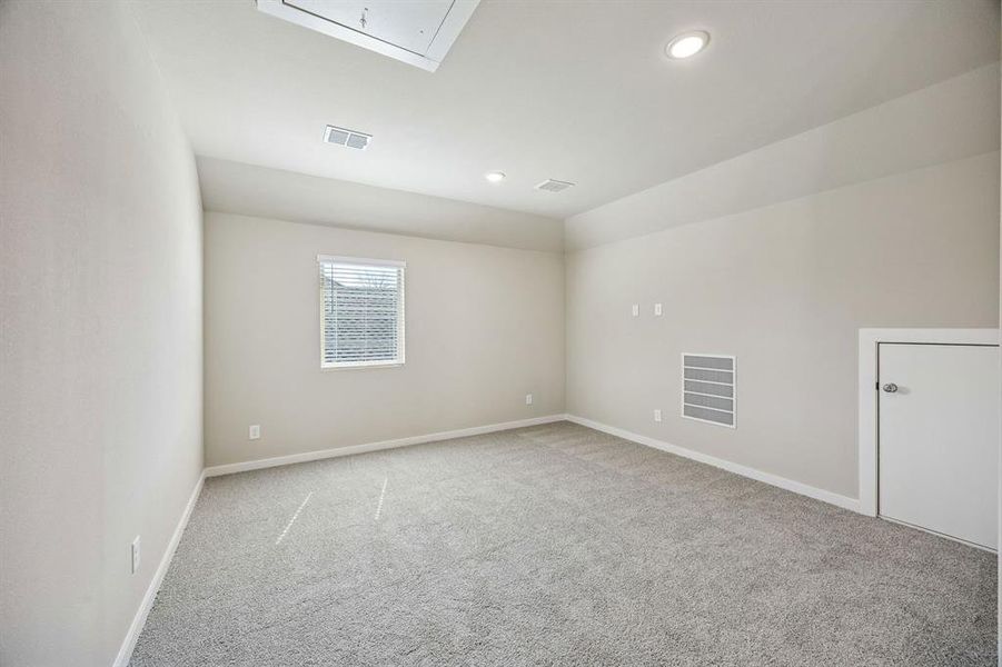 Game Room in the Willow home plan by Trophy Signature Homes – REPRESENTATIVE PHOTO