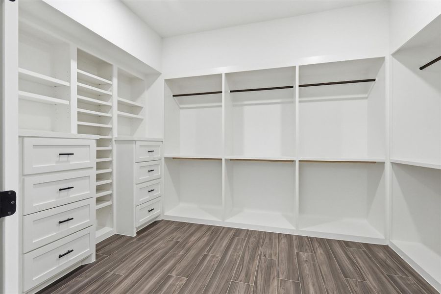 Primary walk in closet, measures 14.5x10.7