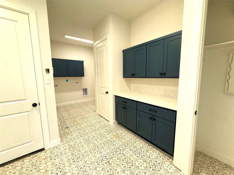 Large family foyer/ utility room! Large family foyer/ utility room!