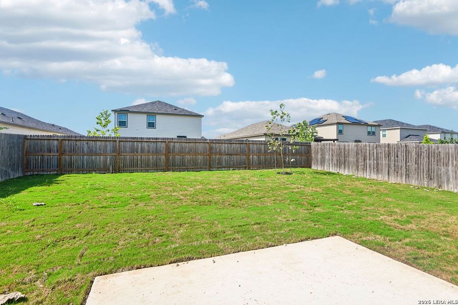 Exterior details and patio area of a home in Woodside Farms, Seguin (Image 3).