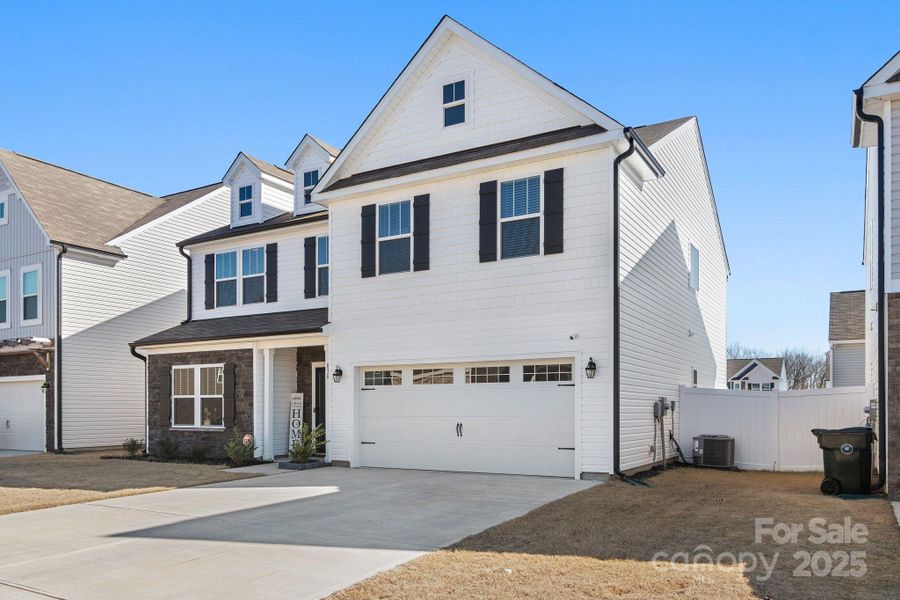 Front exterior of a new home in , York, SC, highlighting curb appeal (Image 1). Front exterior of a new home in , York, SC, highlighting curb appeal (Image 1).