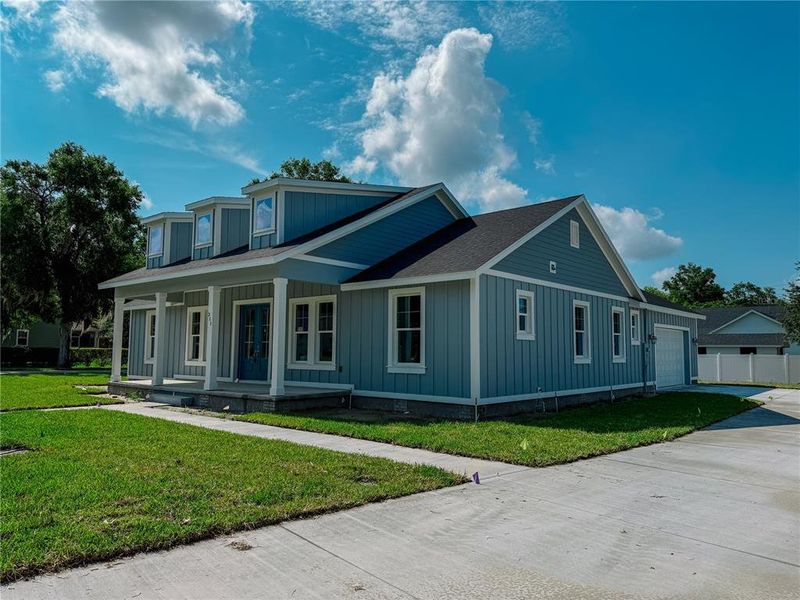 Front exterior of a new home in , Lake Helen, FL, highlighting curb appeal (Image 31). Front exterior of a new home in , Lake Helen, FL, highlighting curb appeal (Image 31).