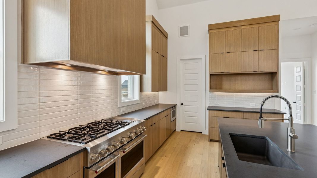 Representative furnished interior of a home built from the Reese II by Southgate Homes in The Reserve at Watters, Allen (Image 4).