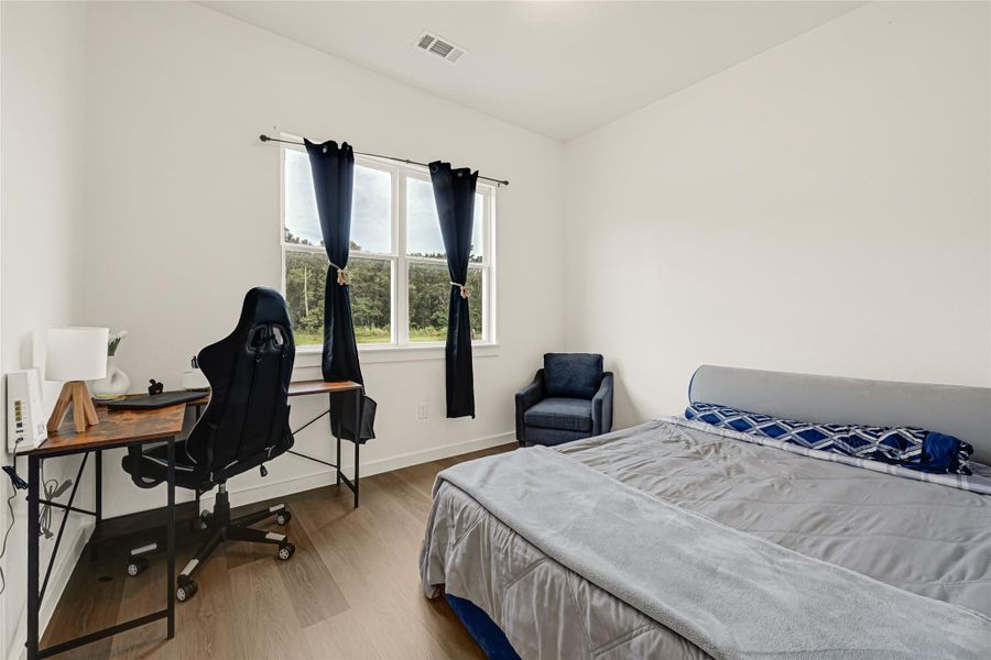 Furnished interior view inside a new home in , Conroe (Image 24).