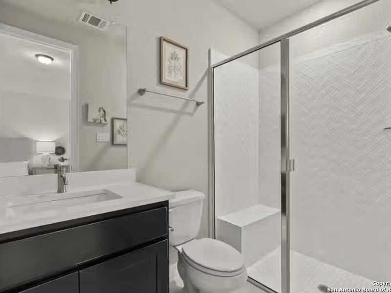 Furnished interior view inside a new home in Potranco Oaks, Castroville (Image 26).