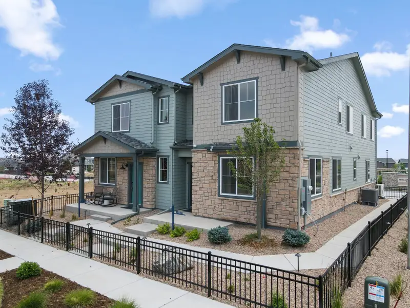 Representative exterior photo of a completed home built from the Acadia by Risewell Homes in Pintail Commons at Johnstown Village, Johnstown, CO (Image 1). Representative exterior photo of a completed home built from the Acadia by Risewell Homes in Pintail Commons at Johnstown Village, Johnstown, CO (Image 1).