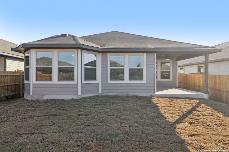 Exterior details and patio area of a home in Catalina, Converse (Image 23).