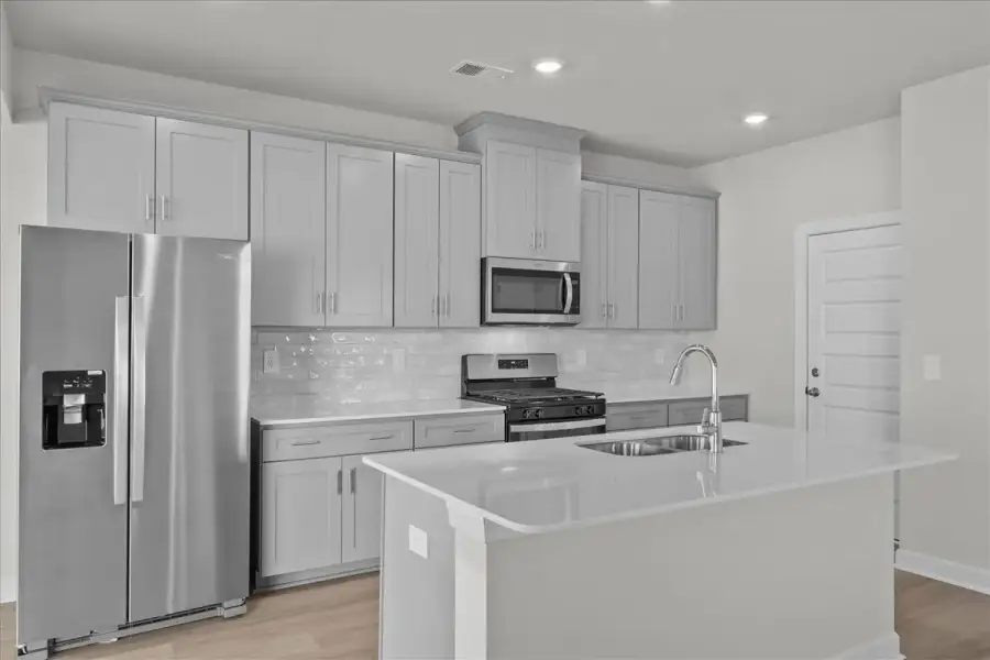 Furnished interior view inside a new home in Creek Ridge - Heritage Collection, Spartanburg (Image 4).