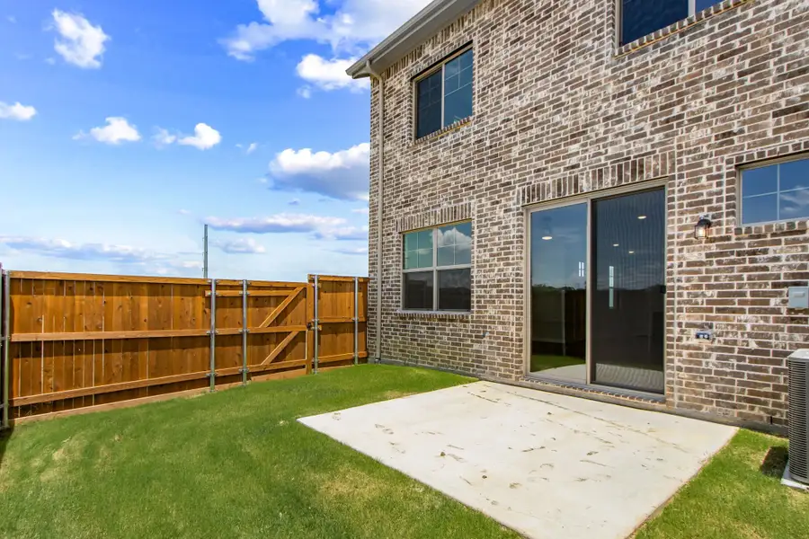 Exterior details and patio area of a home in Wildridge, Oak Point (Image 4). Exterior details and patio area of a home in Wildridge, Oak Point (Image 4).