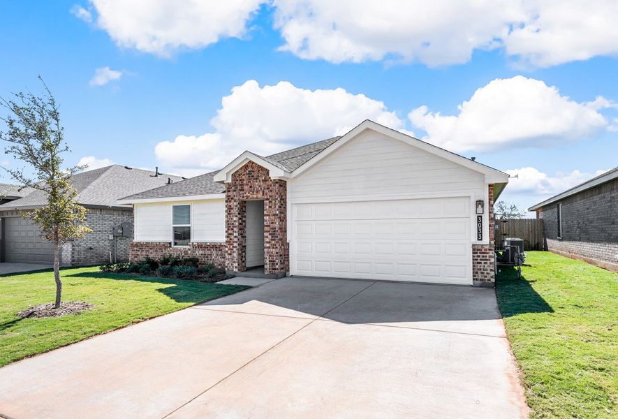 Representative exterior photo of a completed home built from the BELLVUE by D.R. Horton in Faculty Row, Abilene, TX (Image 4).