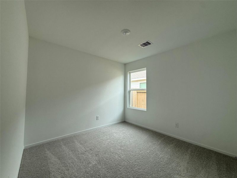 Spacious, unfurnished interior of a new home in Sweetgrass Village: Cottage Collection, Crosby (Image 13).