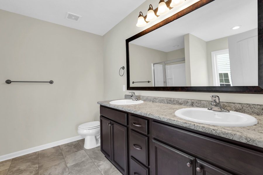 Representative furnished interior of a home built from the The Morris by RTS Homes in Grand Reserve, Hinesville (Image 17).