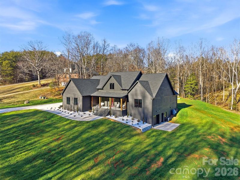 Front exterior of a new home in , Hickory, NC, highlighting curb appeal (Image 24).