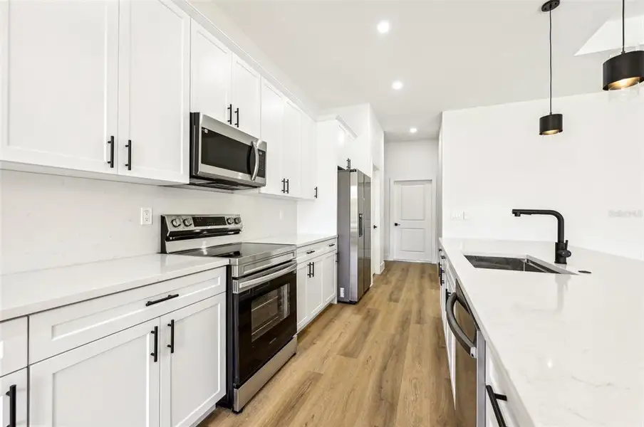 Furnished interior view inside a new home in , North Port (Image 7).