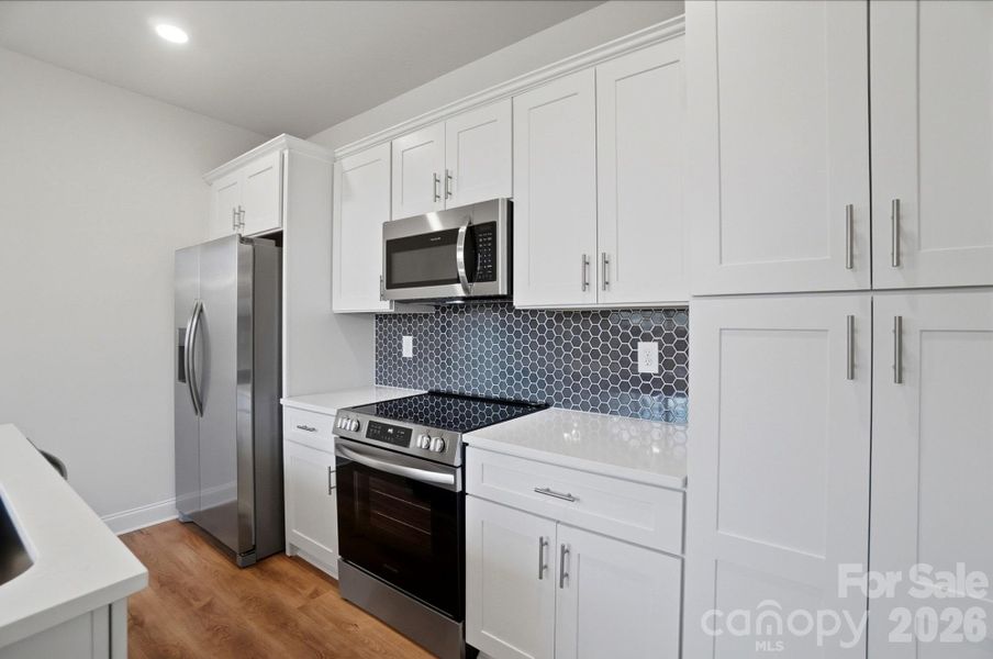 Furnished interior view inside a new home in , Charlotte (Image 8). Furnished interior view inside a new home in , Charlotte (Image 8).