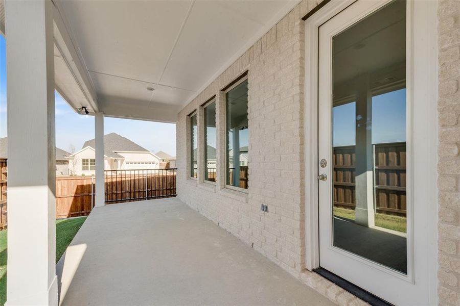 Exterior details and patio area of a home in Villages of Hurricane Creek, Anna (Image 3). Exterior details and patio area of a home in Villages of Hurricane Creek, Anna (Image 3).