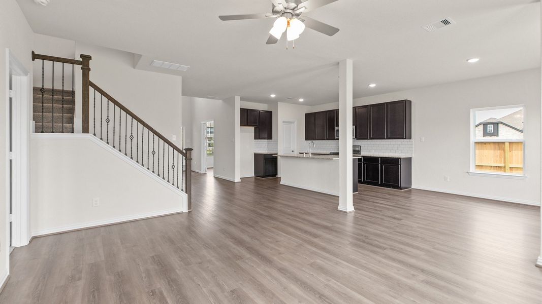 Representative furnished interior of a home built from the Southfork by Brightland Homes in Sunterra, Katy (Image 10).
