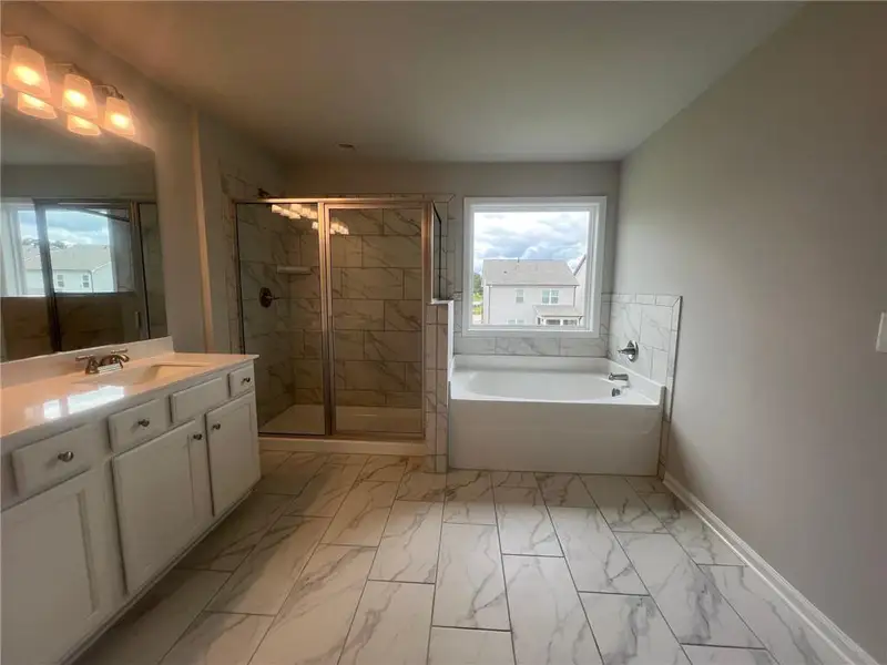 Furnished interior view inside a new home in Crofton Place Enclave, Snellville (Image 5).