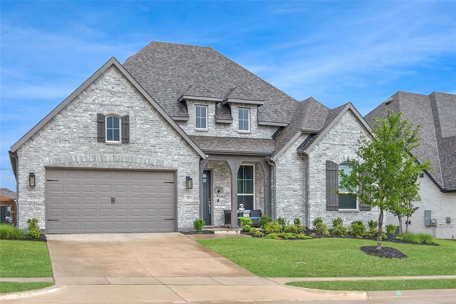 Front exterior of a new home in , Van Alstyne, TX, highlighting curb appeal (Image 23).