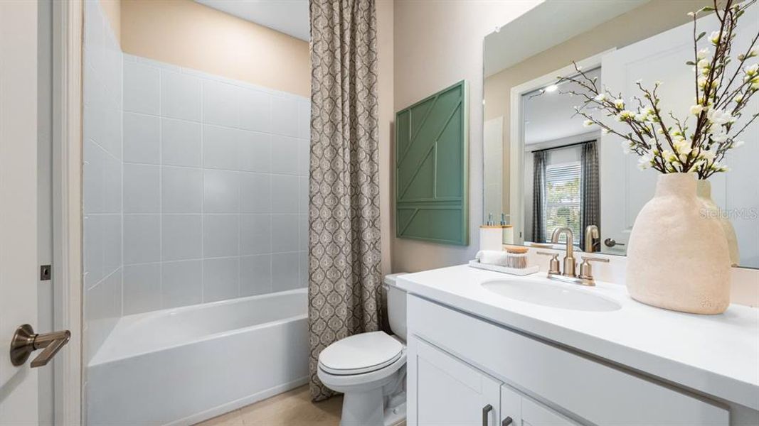 Furnished interior view inside a new home in Esplanade at Wiregrass Ranch, Wesley Chapel (Image 30).