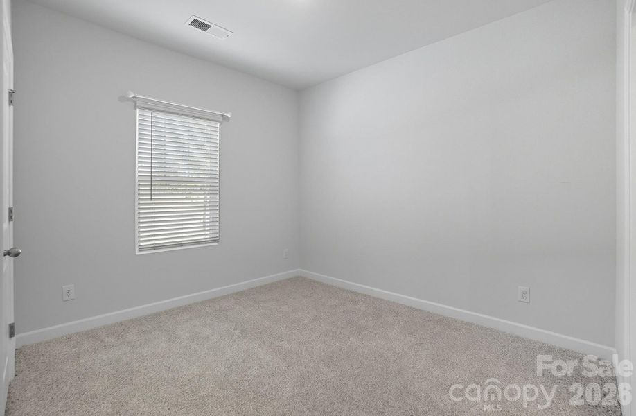 Spacious, unfurnished interior of a new home in Solena at the Vineyards II, Charlotte (Image 34).