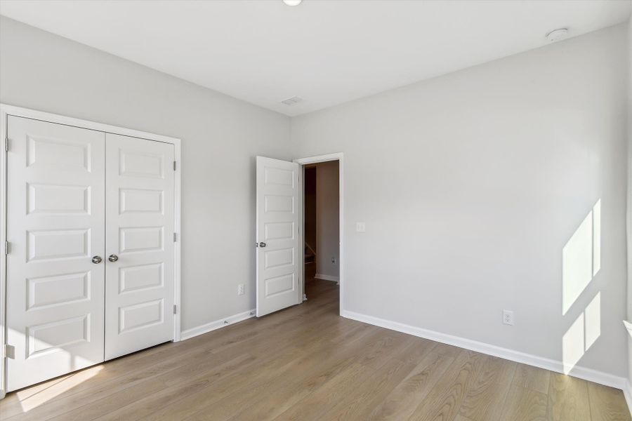 Spacious, unfurnished interior of a new home in Saint John's Lake: Arbor Collection, Johns Island (Image 24).