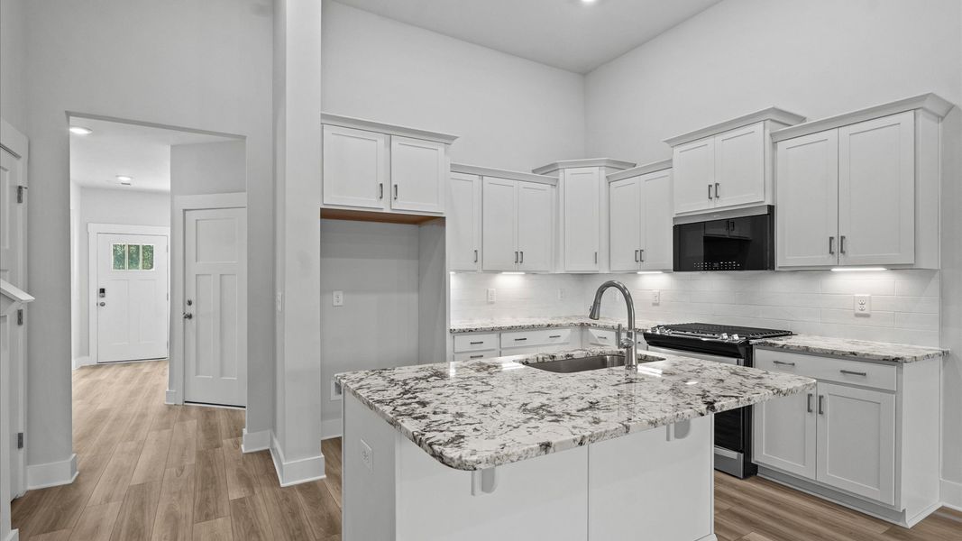 Furnished interior view inside a new home in Camden Cottages, Greenville (Image 14).