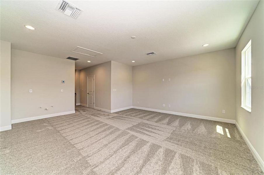 Spacious, unfurnished interior of a new home in Hidden Lakes, Brandon (Image 43).