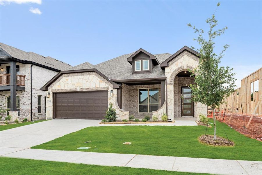 Front exterior of a new home in Anderson Crossing, Trenton, TX, highlighting curb appeal (Image 2). Front exterior of a new home in Anderson Crossing, Trenton, TX, highlighting curb appeal (Image 2).