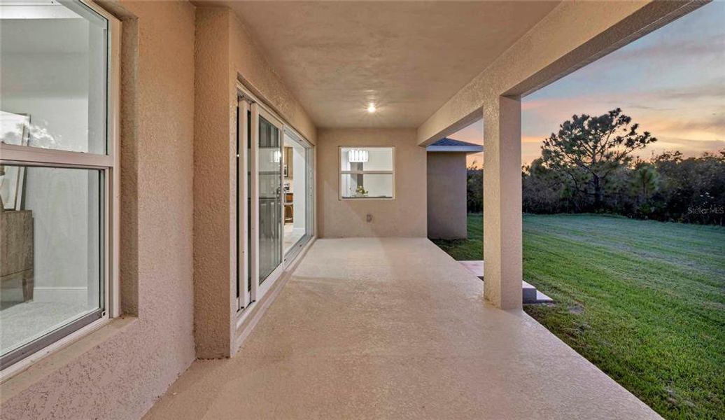 Exterior details and patio area of a home in , Port Charlotte (Image 2).