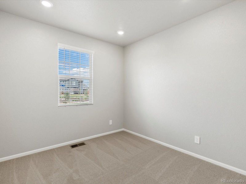 Spacious, unfurnished interior of a new home in Ridgeline Vista: The Flora Collection, Brighton (Image 17). Spacious, unfurnished interior of a new home in Ridgeline Vista: The Flora Collection, Brighton (Image 17).