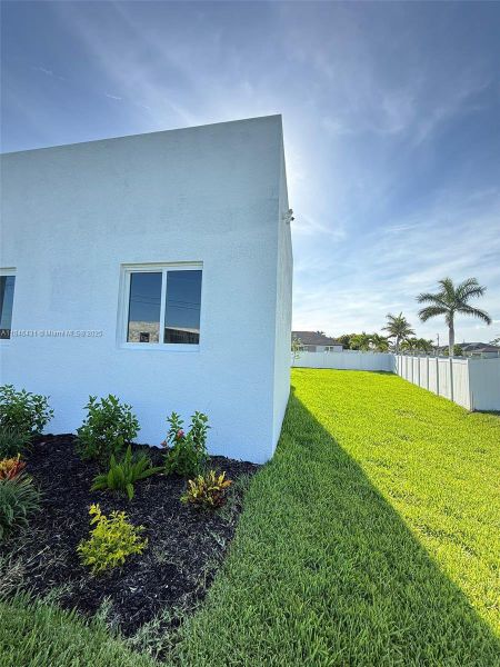 Front exterior of a new home in , Cape Coral, FL, highlighting curb appeal (Image 19).