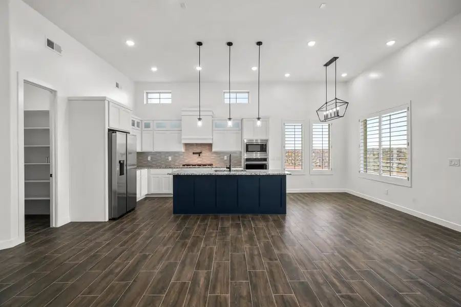 Representative furnished interior of a home built from the Scottsdale by LEH. Homes in Verdancia, El Paso (Image 6).