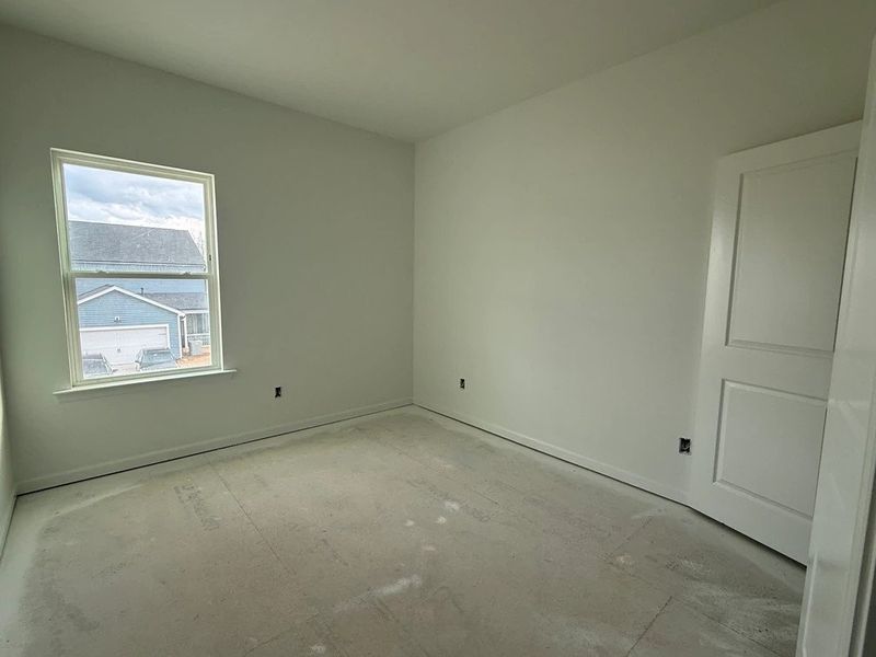 Bed 2 featuring the AW Collection® Artisan - Natural light creates a grounded retreat.