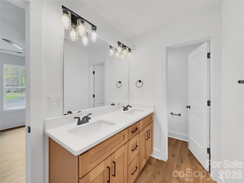 Primary bathroom with dual vanity Primary bathroom with dual vanity