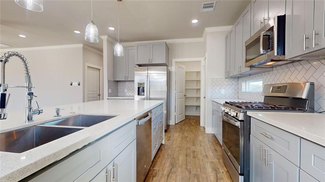 Another view of the spacious kitchen.  In the background is a large walk-in pantry.