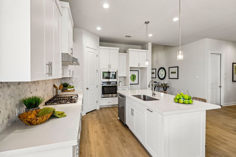 Furnished interior view inside a new home in 6 Creeks, Kyle (Image 7).
