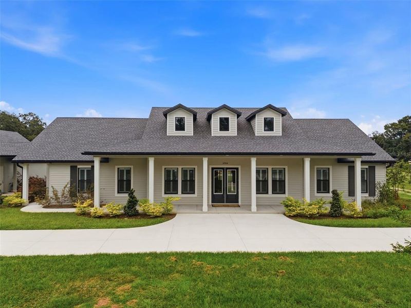 Front exterior of a new home in , Dade City, FL, highlighting curb appeal (Image 23). Front exterior of a new home in , Dade City, FL, highlighting curb appeal (Image 23).
