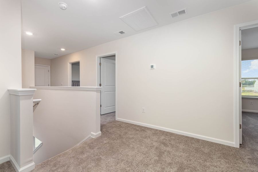 Representative unfurnished interior of a home built from the GALEN by D.R. Horton in The Meadows at Wildwood Village, Shallotte (Image 19).