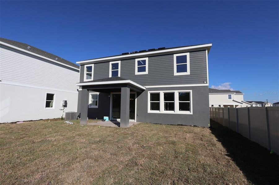 Exterior details and patio area of a home in Center Lake on the Park, St. Cloud (Image 9). Exterior details and patio area of a home in Center Lake on the Park, St. Cloud (Image 9).
